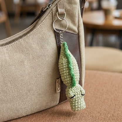 WoolyArtis Crochet Crocodile Fidget Toy keychain with textured amigurumi design, perfect for stress relief and tactile sensory play.